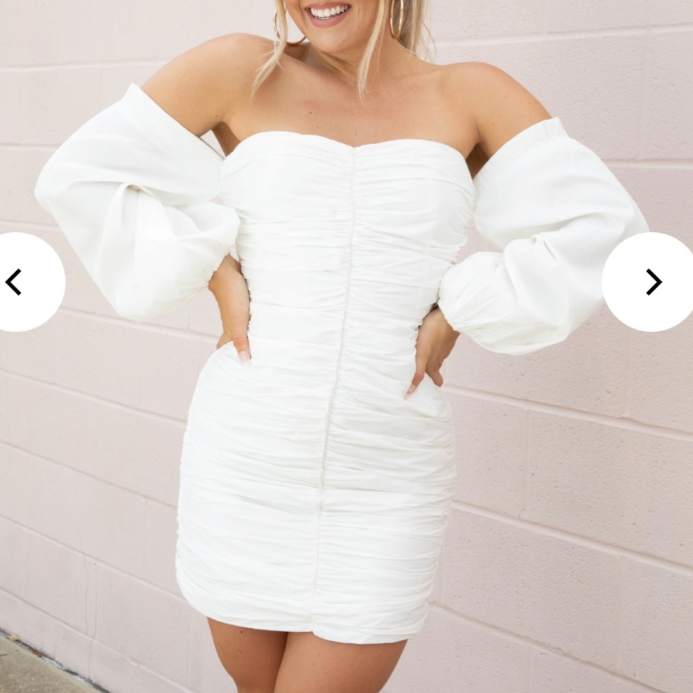 White smocked off the shoulder dress. Size medium RUNS SMALL (fits like s or xs)